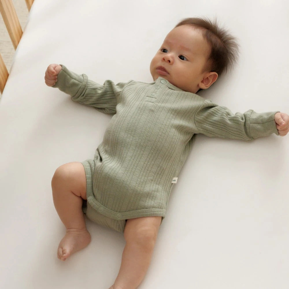 Woolbabe Organic Cotton/Merino Long Sleeve Henley Bodysuit