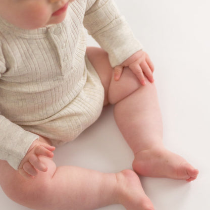 Woolbabe Organic Cotton/Merino Long Sleeve Henley Bodysuit Natural Marl