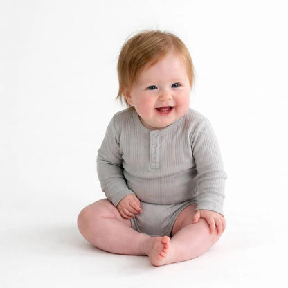 Woolbabe Organic Cotton/Merino Long Sleeve Henley Bodysuit