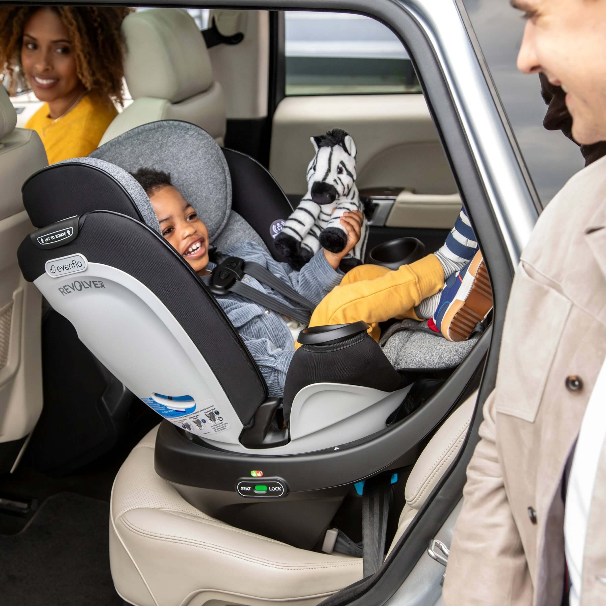 how to take off evenflo car seat base