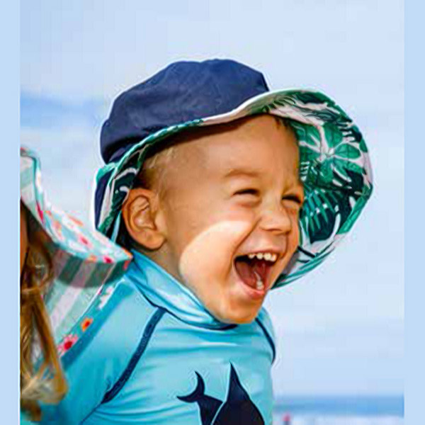 banz-carewear-sunhat-Tropical-Forest-Navy-worn-reversed