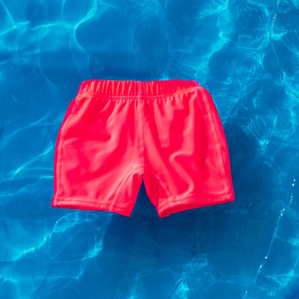 Neon by Nestling Swim Shorts Neon Pink Baby On The Move